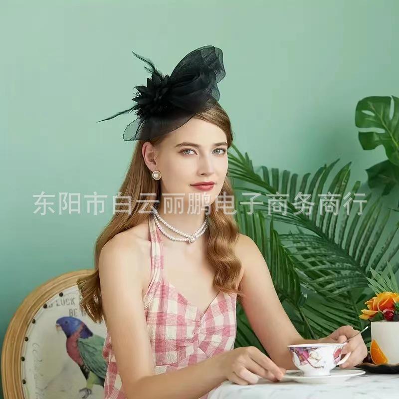 LP-0035(兔耳朵网纱鸡毛花两用）.jpg