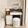Tocador pequeño y extensible con tablero de mesa engrosado de color nogal, que cuenta con un tocador incorporado con cajones - un tocador completo para dormitorio