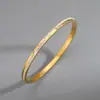 Pulsera de Acero Inoxidable Dorado con Diseño de Nicho Integral Estilo Europeo y Americano con Números Romanos Pulsera de Lujo Ligero Alta Gama Joyería de Mano