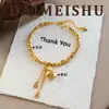 Nuevo Pulsera de Carrusel de Monedas de Cobre Huecas Exquisita de Moda Versátil Estilo Chino Retro con un Toque de Lujo de Gama Alta y Joyería de Borla