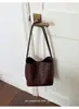 Bolso de cubo tejido con textura transfronterizo para llevar en la mano para mujer, bolso nuevo retro de alta gama, bolso para axila madre e hijo, bolso de un solo hombro, moderno