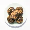 Té aromático de bola de dragón Pu'er hecho a mano de Yunnan transfronterizo té de bola de dragón de jazmín venta al por mayor té aromático de bola de dragón flor de rosa y peonía