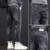 Jeans de Hombre de Primavera Hombres Venta al por Mayor Nuevos Rectos Sueltos Elásticos de Marca de Moda Adelgazantes Retro Americano Pantalones Largos Verano