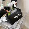 Nova bolsa de cosméticos pequena estilo Chanel, bolsa de viagem portátil para armazenamento, bolsa de higiene, bolsa clutch de moda europeia e americana