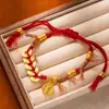 Nuevo Estilo Chino Envoltura Antigua Fa Sha Pulsera Dorada Amarillo Dorado Dios de la Riqueza Marca Redonda Pulsera de Cuerda Roja Cintura de Hombres y Mujeres Línea de Cintura