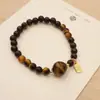 Pulsera de Ojo de Tigre Natural para Mujer Nueva Moda China Pulsera Marca Fu Regalo Pareja Sándalo Simple Elegante Tejida