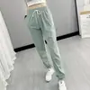 Pantalones deportivos de verano para mujer, ligeros y transpirables, hechos de seda helada, secado rápido, nuevo estilo primavera y otoño, corte holgado, adelgazantes, pantalones casuales con puño
