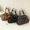 Bolso de Mano Retro con Remaches de Moda de Comercio Exterior para Mujer 2026 Nuevo Bolso de Hombro Moderno Bolso Tote Simple de Gran Capacidad