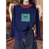 Camiseta de Manga Larga Versátil de Moda Nueva para Mujer 2026 con Cuello y Puños de Algodón Puro en Colores Contrastantes, Adecuada para Primavera y Otoño