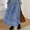Saia plissada xadrez estilo vintage feminina Dongdaemun coreana, saia longa em camadas estilo férias