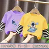 Ropa infantil, camiseta de manga larga para niños, estilo de dos piezas para principios de otoño, nuevo modelo primavera y otoño 2026, camiseta básica de algodón puro, top de otoño