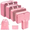 Set organizador de viaje premium, incluye 11 piezas: bolsas para guardar ropa, bolsas con cordón, bolsas para cosméticos y artículos de tocador, y bolsas de malla plegables para almacenamiento