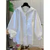 Camisa de encaje de manga larga con capucha de moda estilo europeo con dobladillo de encaje para mujer, elegante y de corte holgado para primavera y otoño