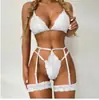 Venta al por mayor transfronteriza 2019 nuevo modelo artesanía compleja empalme de encaje cruzado conjunto de lencería sexy para mujer