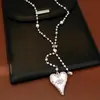 Collar de corazón de perlas con cuentas, estilo minimalista, único y de nicho, cadena para suéter, joyería de moda de lujo ligero de alta gama para mujer, venta al por mayor