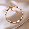 Pulsera de perlas de lujo ligero francés temperamento retro pulsera de moda de alta gama nueva joyería nicho simple al por mayor para mujeres