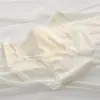 Calcinha feminina em jacquard com laço vazado, antibacteriana 10A, entrepernas alongada, cintura média de alta qualidade, modelagem justa ao quadril, ideal para adolescentes, estilo colegial.