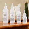 Botella dispensadora de 50 ml con tapa de pico fino en forma de gota, Botella de 100 ml para aceites esenciales, Tubo exprimible, Loción, Agua de maquillaje, Botella de plástico para líquidos