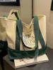 Bolso de lona transfronterizo para mujer, nuevo bolso de hombro grande, simple y elegante, bolso de mano versátil estilo coreano para el día a día