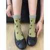 Colección de otoño e invierno: calcetines largos estilo retro para mujer, con tejido transpirable que absorbe el sudor, de diseño sencillo y versátil, y un moderno estampado de grafitis. Estos calcetines de media pantorrilla ofrecen un look juvenil y femenino