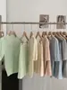 Nuevo Top de Punto Hueco de Manga Corta Estilo Francés para Verano 2026, Blusa de Mujer Versátil a la Moda de Corte Ajustado en Rosa para el Trabajo