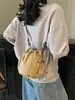 Nova bolsa de balde transfronteiriça, bolsa versátil da moda com cordão estilo japonês para mulheres, bolsa de ombro casual de alta qualidade para viagens