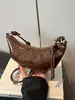 Bolso de Media Luna Texturizado Transfronterizo 2024 Otoño/Invierno Nuevo Bolso para Mujer, Bolso de Hombro con Diseño de Nicho, Bolso Cruzado Retro Simple, Moderno