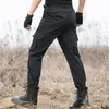 Pantalones de entrenamiento negros al por mayor de fábrica pantalones de entrenamiento de seguridad pantalones de camuflaje para exteriores pantalones tácticos pantalones de trabajo multibolsillo para hombre y mujer