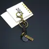 Acessórios de Chaveiro Tecidos em Couro Vintage Feitos à Mão pelo Fabricante Fecho Lagosta Cordão de Couro Versátil Pingente Semi-Acabado DIY