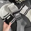 2026 Novas Meias Femininas Simples de Renda na Altura da Panturrilha Color Block Listras Etiqueta de Tecido com Letras Meias de Algodão Estilo ins Versátil Meias Empilhadas