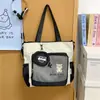 Bolso tipo cubo de moda para estudiante universitario, Primavera 2026, Bolso de mano simple y versátil para el día a día, Bolsa tote multifuncional de gran capacidad