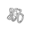 Brincos de pressão com laço vazado e zircônia dupla, modelo ear cuff, tendência da primavera de 2026. Não precisam de furo na orelha.