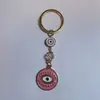 Colgante de Serie Ojo de Diablo Transfronterizo Europeo y Americano Colgante de Llavero de Joyería de Animales Ojo de Hueso con Goteo de Aceite Accesorios de Aleación para Mujeres