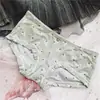 [80-120] 524 Seda de Hielo estampado lindo tiro bajo bolsa de ropa interior para mujer cadera con taladro ropa interior para mujer tiro bajo