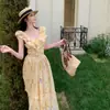 Vestido floral con volantes estilo vacacional de verano para mujer, vestido largo amarillo de un hombro estilo dopamina de verano 2026
