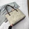 Bolso de mano de gran capacidad popular transfronterizo este año, bolso de hombro retro de nicho nuevo para mujer 2025, bolso de viaje para todo tipo de combinaciones