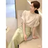 Blusa de Gasa Blanca Francesa de Manga Corta para Mujer 2026 Nuevo Estilo de Verano Top con Lazos en la Espalda y Mangas Abullonadas