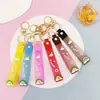 Llavero Colgante de Cordón de Cuero con Letra Transparente Brillante con Accesorios Estilo Muñeca Rellena de Aceite Encanto de Llavero Pulsera Venta al por Mayor