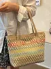 Bolso tejido de gran capacidad para mujer, nuevo modelo 2026, bolso de hombro de gran capacidad, bolso de mano tipo cesta de verduras, bolso de paja de regalo