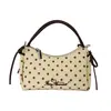 Bolso de mano de lunares estilo coreano para mujer, nuevo modelo 2026, alto valor estético, bolso de hombro simple, bolso cruzado de moda y versátil
