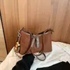 Bolso de mano de diseño nicho de alta gama transfronterizo para mujer, nueva colección otoño 2026, bolso de hombro versátil de estilo coreano retro simple