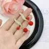 Estilo Coreano Super Fada Doce Diamante Gotejamento de Óleo Laço Amor Borla Brincos Elegantes Leve Luxo Sentido de Alto Padrão Brincos Delicados