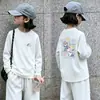 Camiseta de Manga Larga para Niña 2026 Primavera/Otoño Nueva Elegante Mediana/Grande Niños Niñas Pequeñas Cuello Redondo Base de Algodón Puro Parte Superior de Dibujos Animados