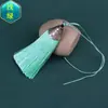 Hermoso pequeño pez boca borla borla hilo de poliéster tapa plana vertical borla pequeña bolsa colgante pequeño regalo