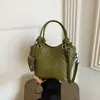 Bolso tejido con patrón único para mujer, nuevo y moderno bolso de hombro de lujo ligero para el verano 2026, bolso cruzado tipo cubo para el trabajo