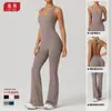 Conjunto de yoga popular europeo y americano de otoño, secado rápido, ajustado, ropa deportiva para danza, deportes y fitness, mono acampanado para mujer que levanta los glúteos y controla el abdomen
