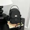 Bolsa pequena versátil para mulheres, nova bolsa de ombro transversal da moda para o dia a dia, bolsa simples para celular estilo coreano