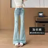 Elegantes jeans acampanados rotos de cintura alta en color azul para mujer, nuevo modelo primavera 2026, pantalones de campana adelgazantes para figuras petite