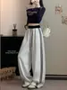 Calça Feminina Listrada de Algodão com Barra Curva Outono Inverno 2026 Nova Patchwork Color Block Casual de Barra Larga Cintura Alta Perna Reta Calça Esportiva