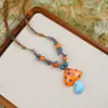 Collar Largo de Cuerda Trenzada con Cuentas de Cerámica Bohemia Coloridas y Estrella de Mar para Mujer, Estilo Étnico Retro